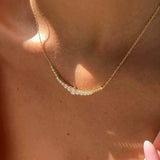 0.95 Carat Pear and Round Diamond Lor Necklace